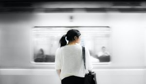 woman waiting for the next train